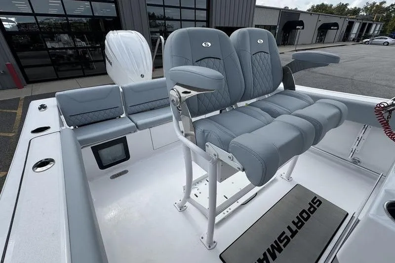 Slide: The Image of 2026 Sportsman Heritage 231 Center Console boat with modern seating and sleek design. - 10