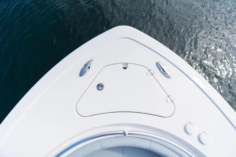 Slide: The Image of Bow of 2026 Sportsman Heritage 231 Center Console on water, showcasing sleek design. - 30