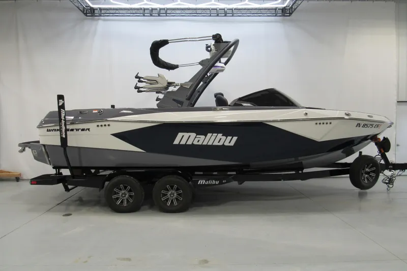 The Image of 2025 Malibu Wakesetter 23 LSV boat on trailer in showroom. - 0
