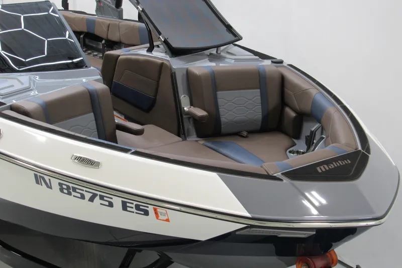 Slide: The Image of 2025 Malibu Wakesetter 23 LSV boat interior with luxurious seating and modern design. - 2