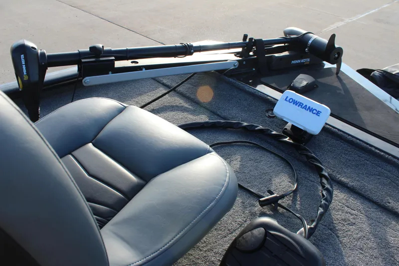 Slide: The Image of 2024 Tracker Pro 170 boat interior with Minn Kota trolling motor and Lowrance fish finder. - 12