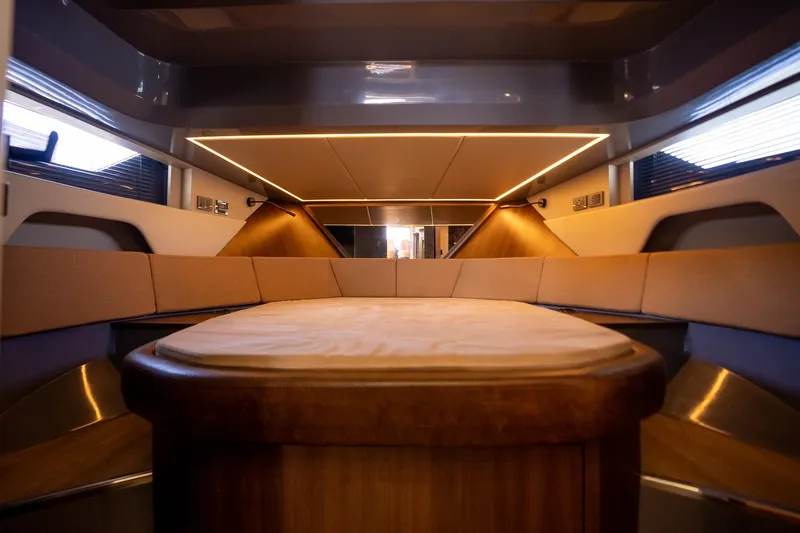 Slide: The Image of Luxurious interior of 2026 Hanover 447 yacht with modern lighting and seating. - 22