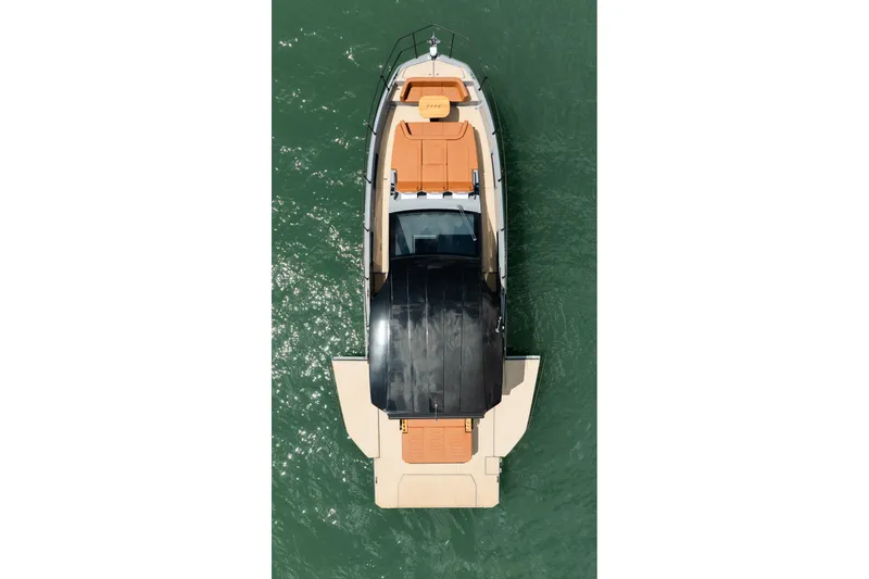 Slide: The Image of Top view of 2026 Hanover 447 yacht on green water. - 3