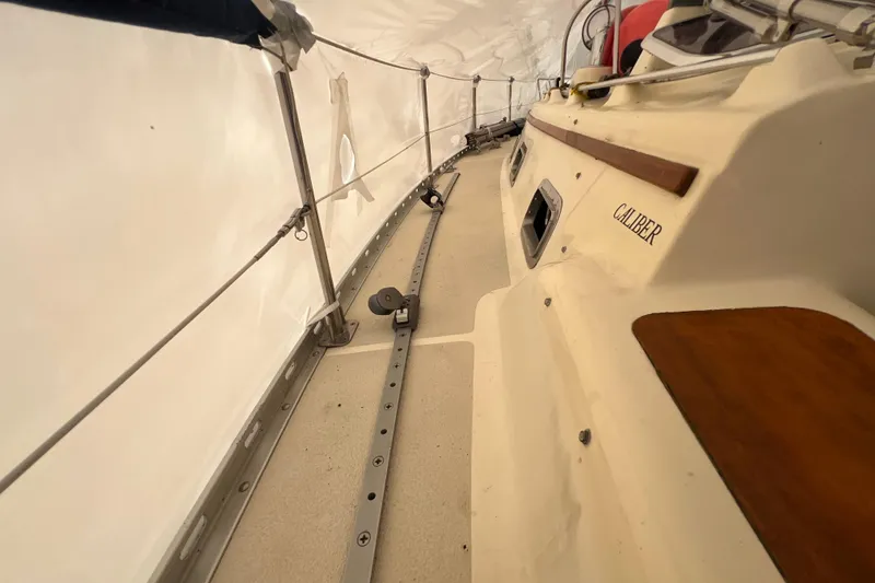 Slide: The Image of 1996 Caliber 35 LRC sailboat deck with railing and fittings. - 14