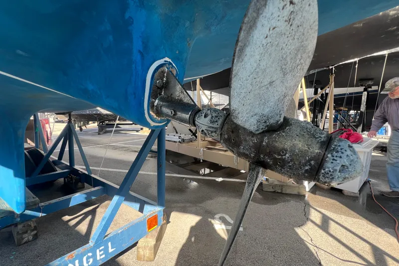 Slide: The Image of Close-up of a 1996 Caliber 35 LRC sailboat propeller on a trailer. - 3
