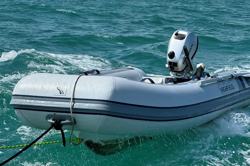 Slide: The Image of Inflatable boat with outboard motor on ocean waves, NEEL 43, 2023 model. - 16
