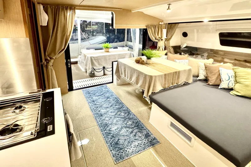 Slide: The Image of Luxurious interior of 2023 NEEL 43 yacht with cozy seating and elegant decor. - 7
