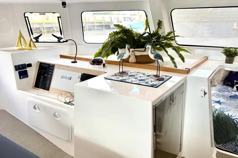 Slide: The Image of Modern NEEL 43 yacht interior with navigation panel, decor, and cozy cabin, 2023 model. - 8