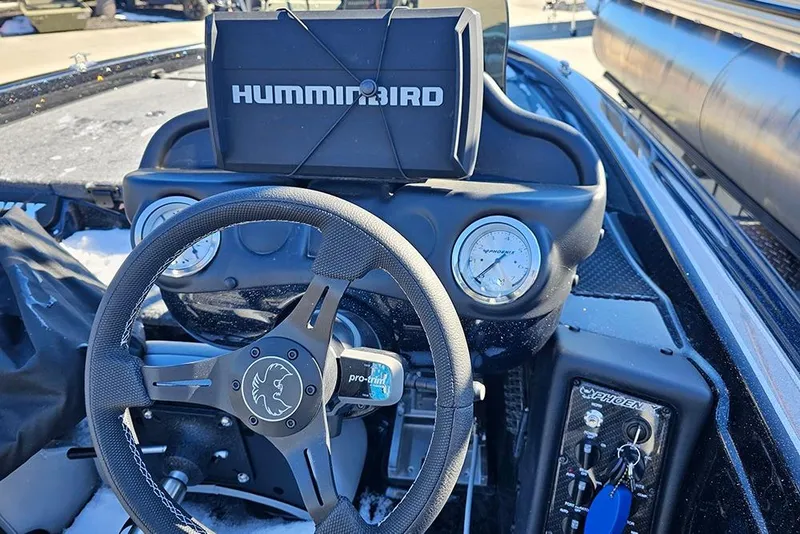 Slide: The Image of Steering console of 2025 Phoenix 819 ZXL boat with Humminbird electronics. - 8