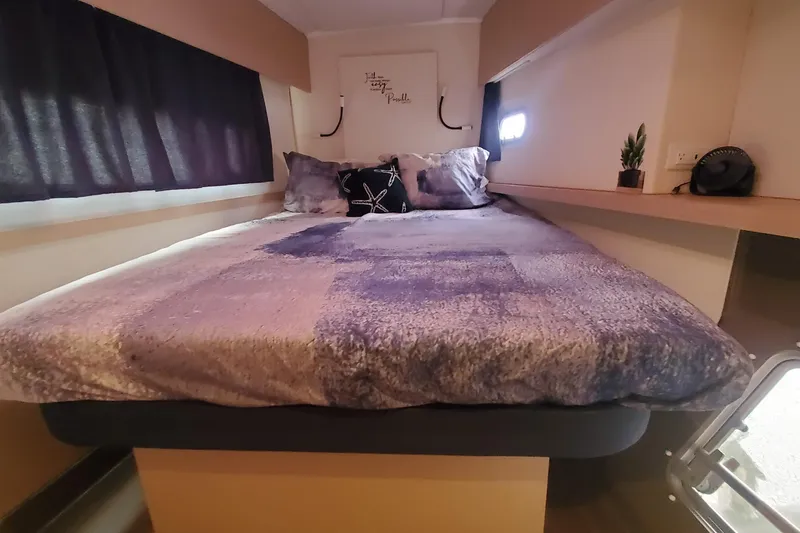 Slide: The Image of Cozy bedroom in 2018 Fountaine Pajot Helia 44 Evolution catamaran with plush bedding. - 12