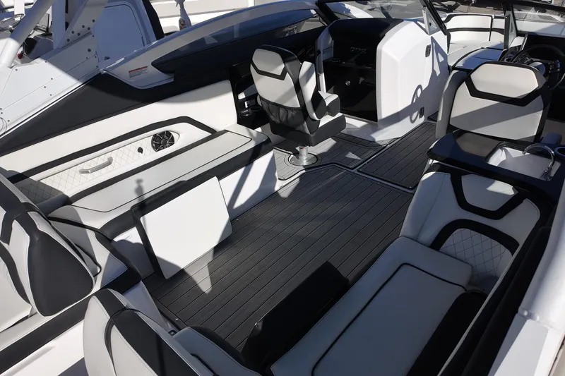 Slide: The Image of 2024 Yamaha Boats 275SE interior with sleek seating and modern design. - 5