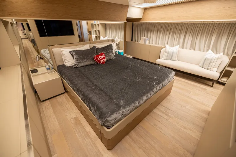 Slide: The Image of Luxurious bedroom interior of 2021 Ferretti Yachts 920 with elegant decor and cozy bedding. - 15