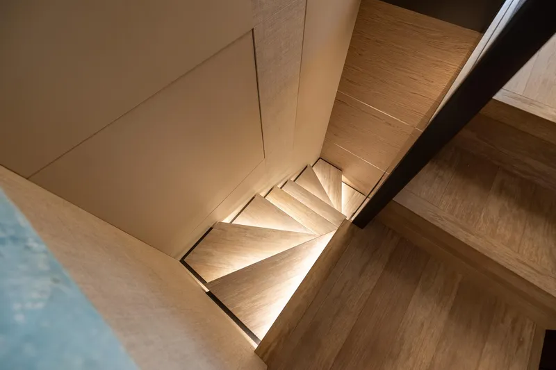 Slide: The Image of Elegant wooden staircase on 2021 Ferretti Yachts 920, showcasing modern design and craftsmanship. - 20
