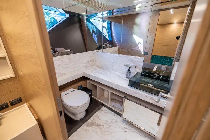 Slide: The Image of Luxurious bathroom in 2021 Ferretti Yachts 920, featuring marble surfaces and modern fixtures. - 23