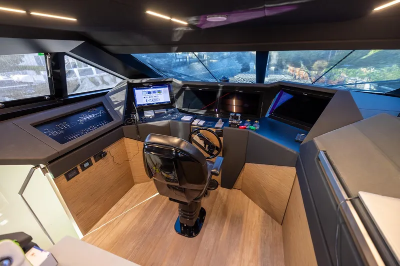 Slide: The Image of Cockpit of 2021 Ferretti Yachts 920, featuring modern navigation and control systems. - 32