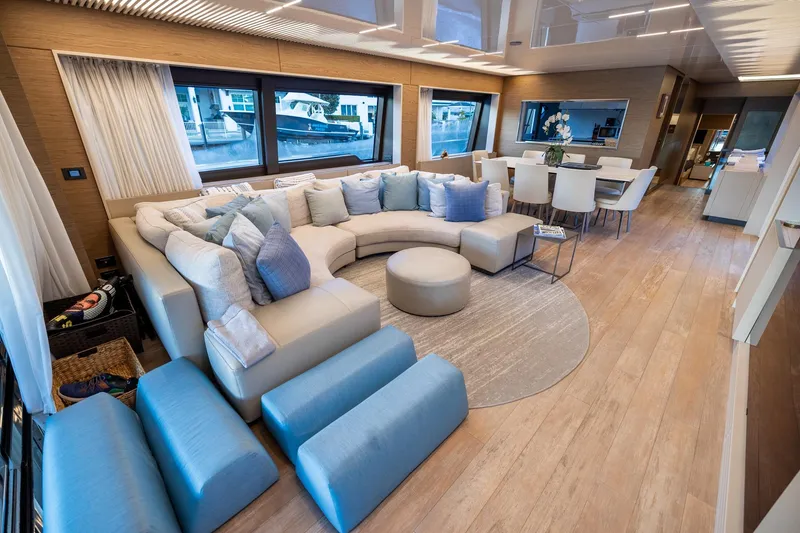 Slide: The Image of Luxurious interior of 2021 Ferretti Yachts 920 with elegant seating and dining area. - 8