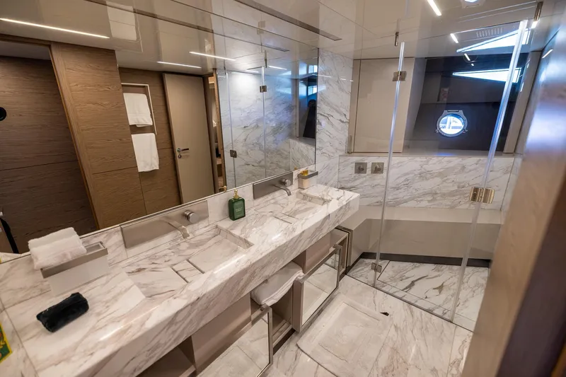 Slide: The Image of Luxurious marble bathroom in 2021 Ferretti Yachts 920, featuring modern fixtures and elegant design. - 18