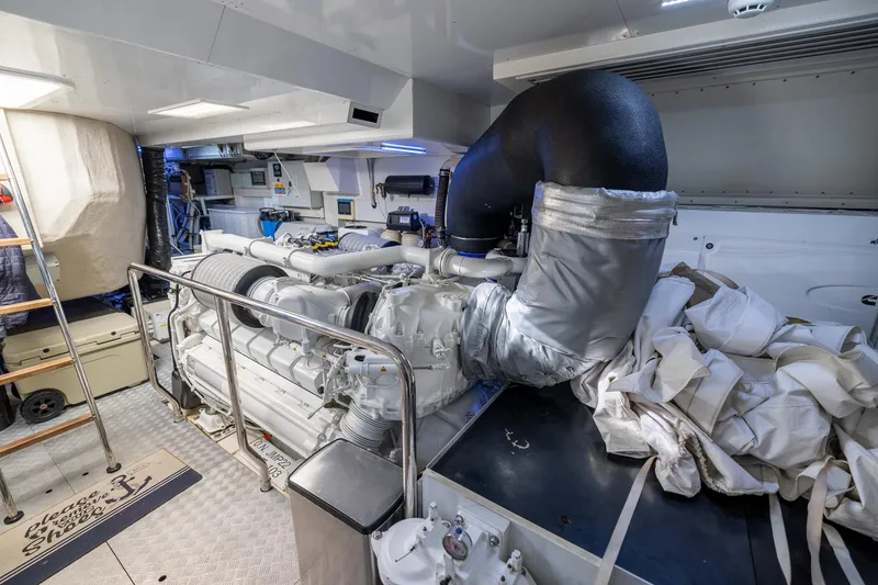 Slide: The Image of Engine room of 2021 Ferretti Yachts 920, showcasing advanced machinery and equipment. - 38