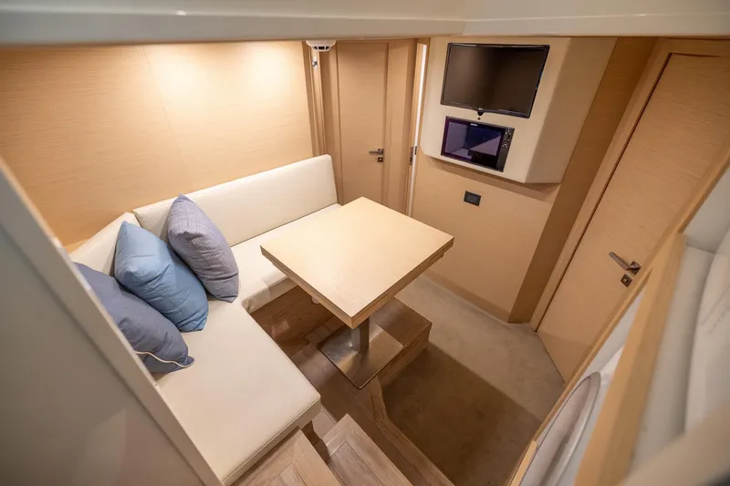 Slide: The Image of Luxurious interior of 2021 Ferretti Yachts 920 with cozy seating and modern amenities. - 42