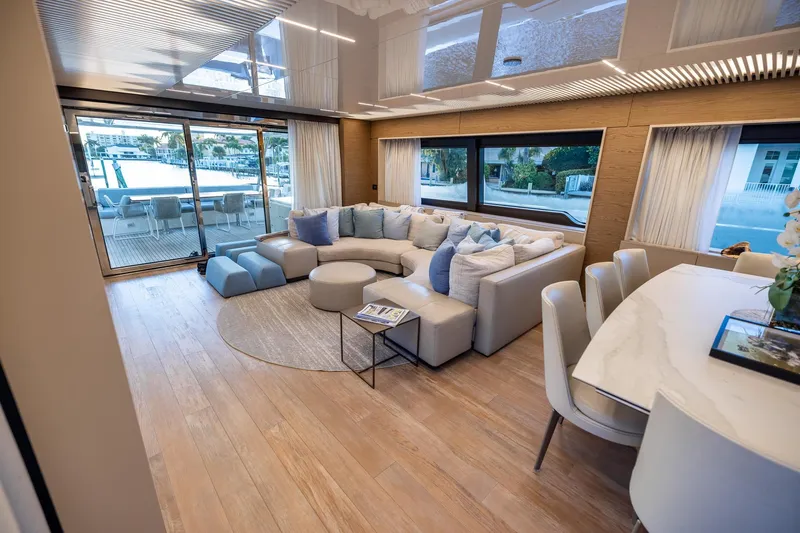 Slide: The Image of Luxurious interior of 2021 Ferretti Yachts 920 with elegant seating and dining area. - 7