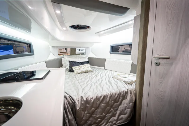 Slide: The Image of Luxurious interior of 2026 Hanover 347 yacht with elegant bedding and modern design. - 13