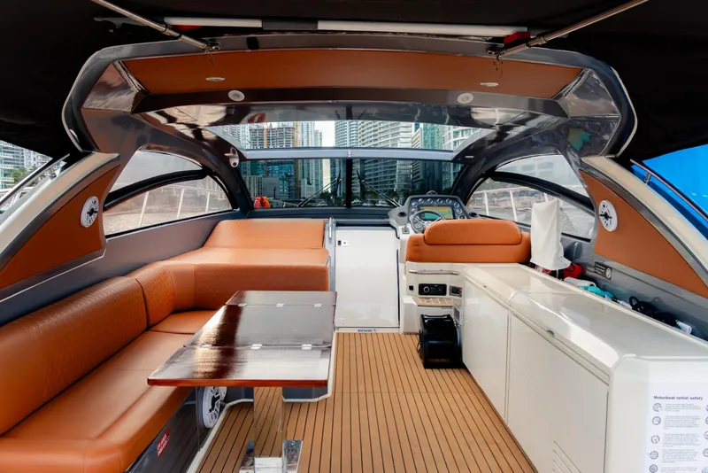 Slide: The Image of Luxurious interior of 2013 Azimut Atlantis 48 yacht with elegant seating and modern dashboard. - 11