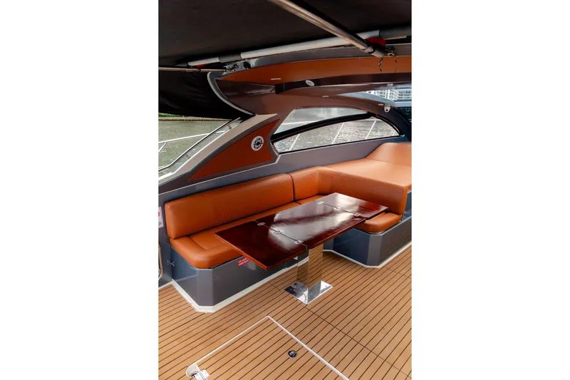 Slide: The Image of Luxurious interior of 2013 Azimut Atlantis 48 yacht with elegant seating and table. - 12