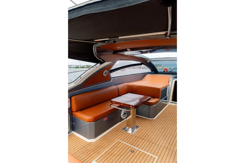 Slide: The Image of Luxurious interior of 2013 Azimut Atlantis 48 yacht with elegant seating and wooden flooring. - 14