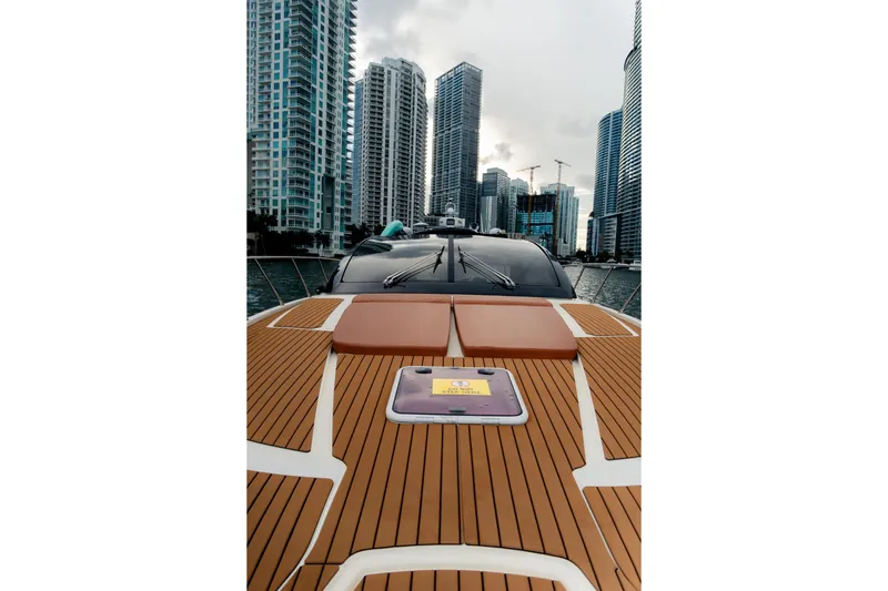 Slide: The Image of 2013 Azimut Atlantis 48 yacht cruising in urban waterfront setting. - 16