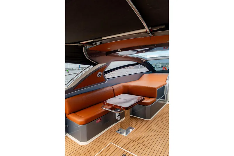 Slide: The Image of Luxurious interior of 2013 Azimut Atlantis 48 yacht with elegant seating and wooden table. - 17