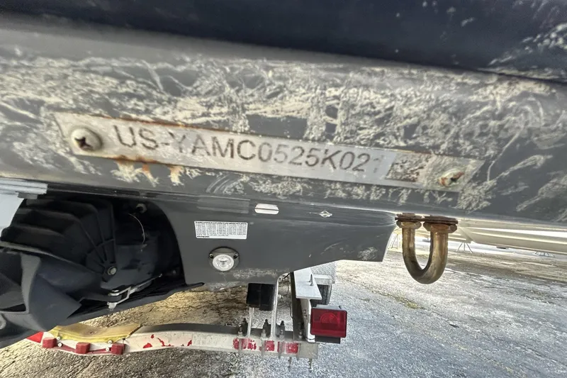 Slide: The Image of 2021 Yamaha Boats 275SE hull identification number on trailer, close-up view. - 13