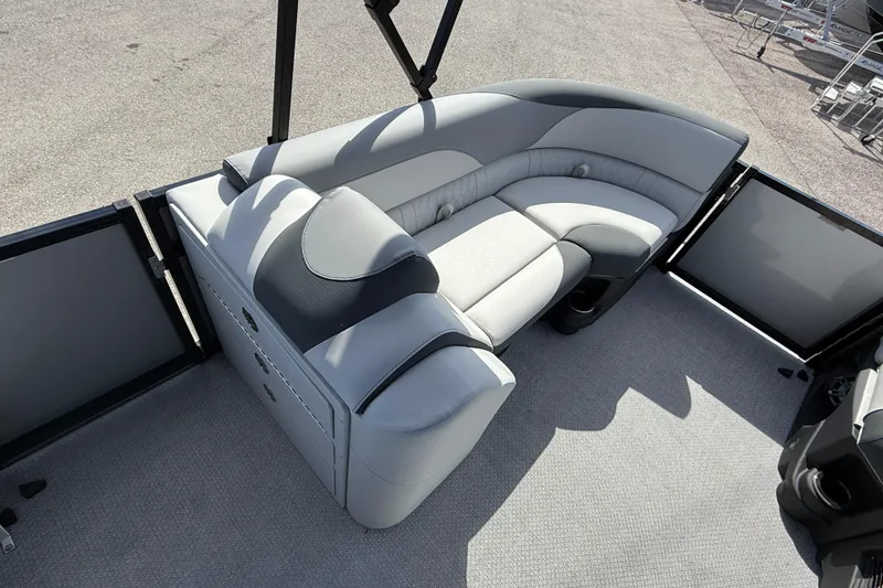 Slide: The Image of 2026 Avalon 2385 LSZ Rear Fish Tri Toon boat interior with plush seating. - 13