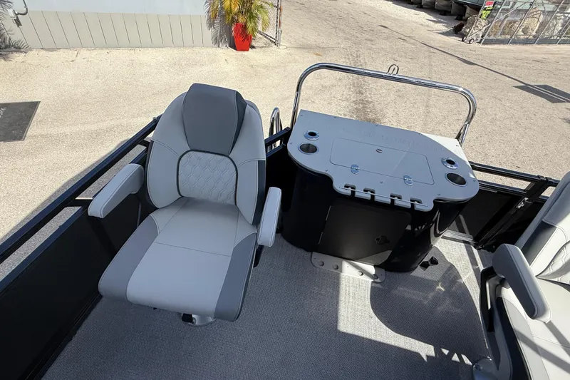 Slide: The Image of 2026 Avalon 2385 LSZ Rear Fish boat interior with seating and control panel. - 23