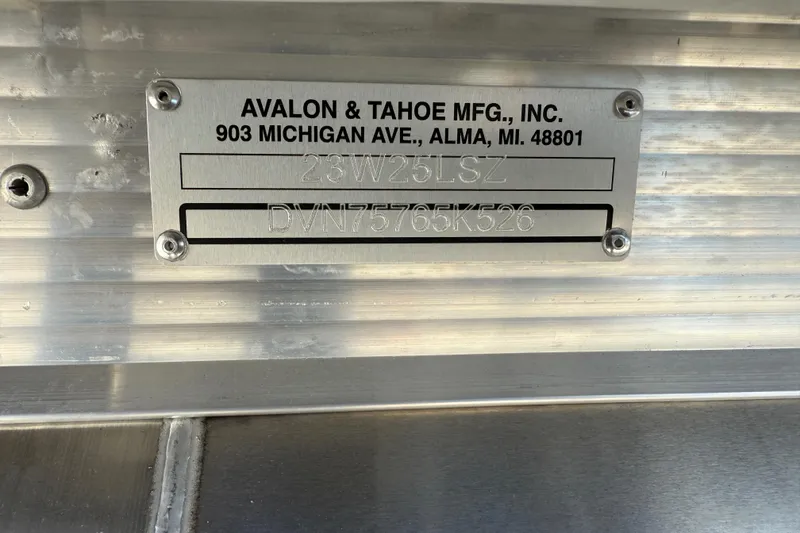 Slide: The Image of Metal identification plate on Avalon 2385 LSZ Rear Fish, Tri Toon, 2026 model. - 30