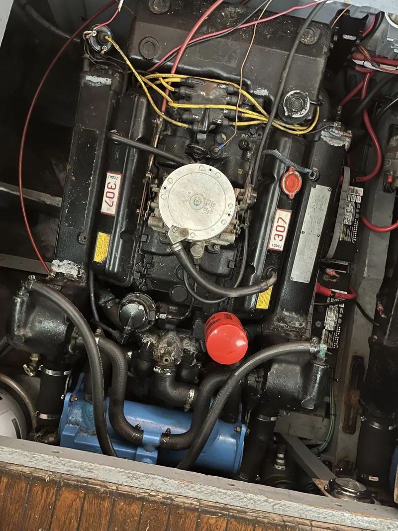 Slide: The Image of Engine of a 1959 Owens Cabin boat with wires and hoses. - 20