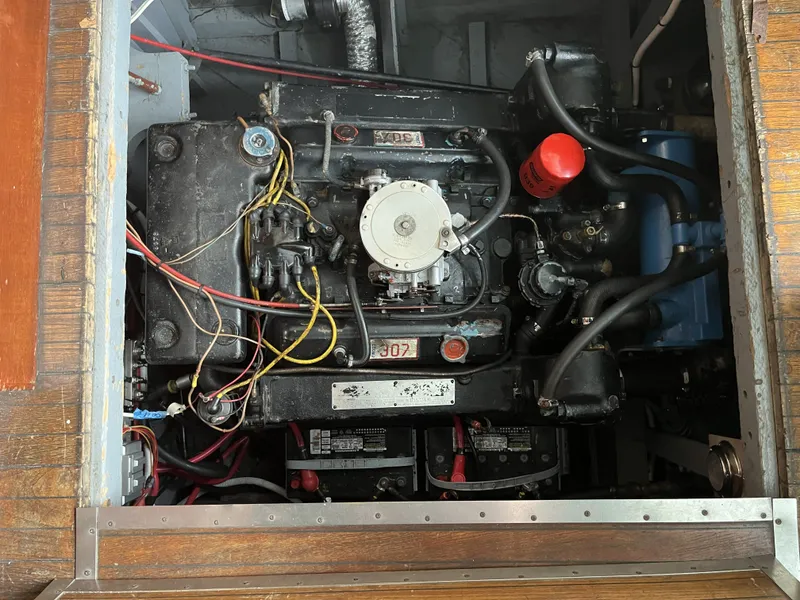 Slide: The Image of Engine compartment of a 1959 Owens Cabin boat with wiring. - 21