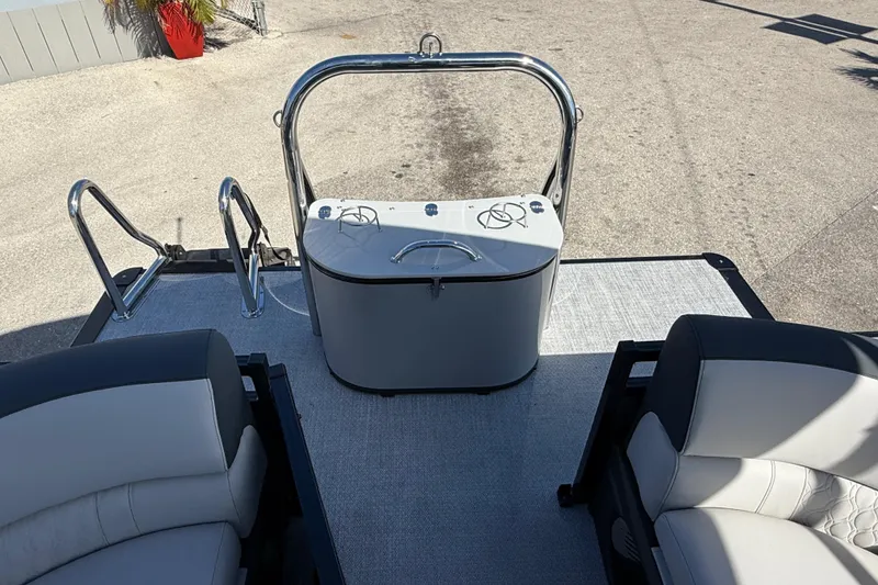 Slide: The Image of 2026 Avalon 2385 LSZ Quad Lounger, Tri Toon boat interior with seating and railing. - 20