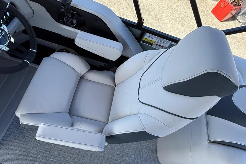 Slide: The Image of Luxurious seating in 2026 Avalon 2385 LSZ Quad Lounger, Tri Toon boat interior. - 23