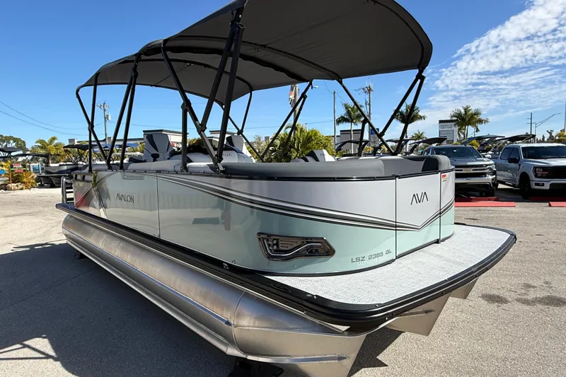 Slide: The Image of 2026 Avalon 2385 LSZ Quad Lounger Tri Toon boat with high performance features. - 4