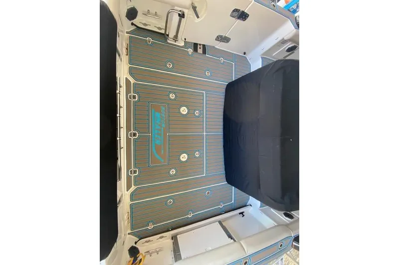 Slide: The Image of 2021 Boston Whaler 420 Outrage boat deck with custom flooring and seating. - 13