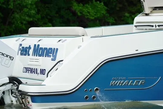 Slide: The Image of 2021 Boston Whaler 420 Outrage boat named "Fast Money" in Coffman, MO, on water. - 3