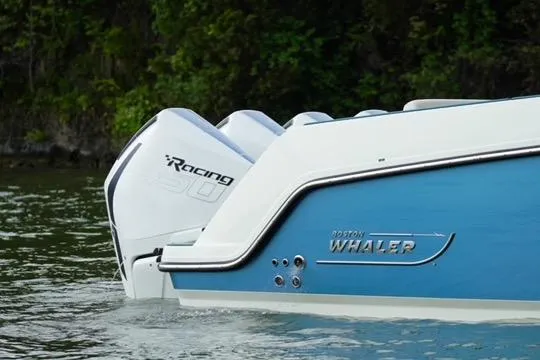 Slide: The Image of 2021 Boston Whaler 420 Outrage boat with powerful engine on water. - 5