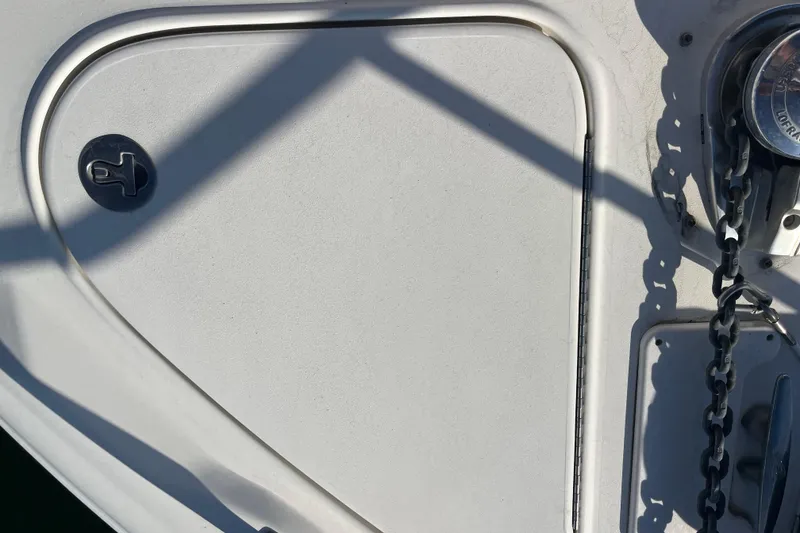 Slide: The Image of 2003 Searay 380 boat deck with anchor chain and hatch detail. - 10