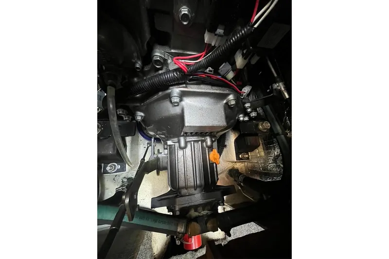 Slide: The Image of 1978 CAL 34 engine compartment with visible wiring and components. - 12