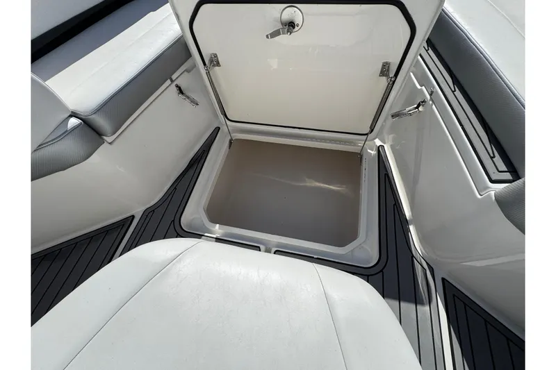 Slide: The Image of Open storage compartment on 2019 Fountain 34 Center Console boat. - 11