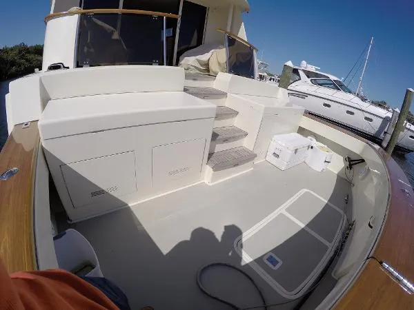 Slide: The Image of Hatteras 74 Custom Cockpit Motor Yacht 1990 - 2