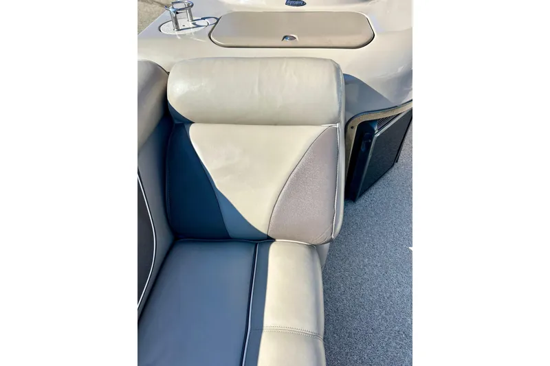 Slide: The Image of 2007 Premier 250 Intrigue boat seat with beige and blue upholstery. - 19