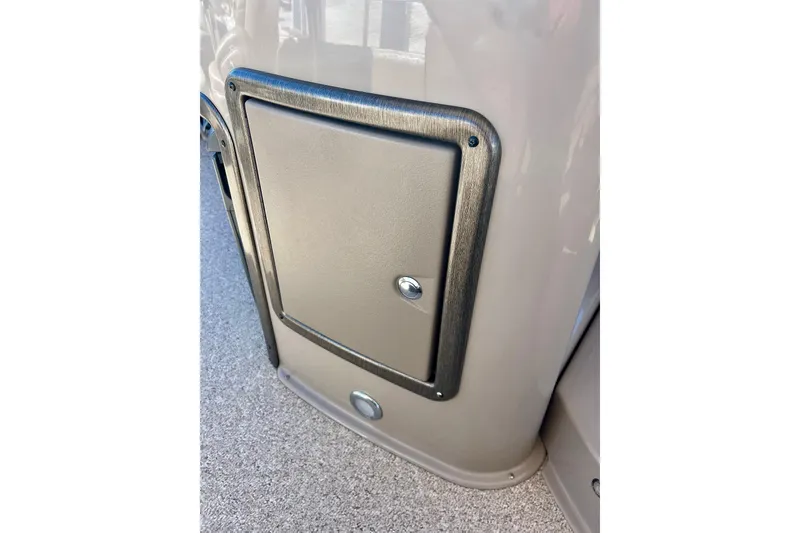 Slide: The Image of Access panel on 2007 Premier 250 Intrigue boat, featuring a sleek metallic finish. - 31