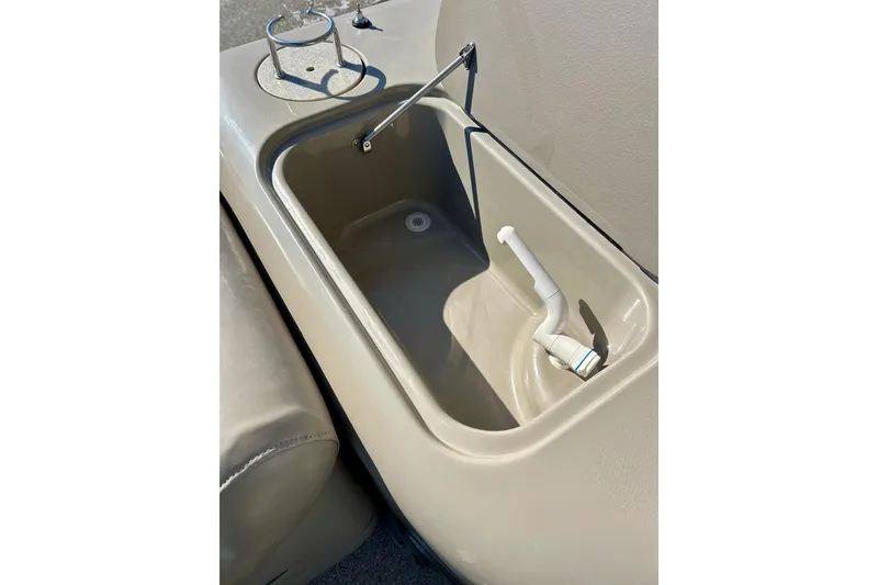 Slide: The Image of 2007 Premier 250 Intrigue boat sink with faucet and cup holder. - 36