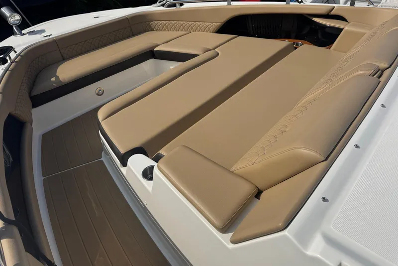Slide: The Image of Luxurious seating area on 2022 Sea Ray Sundancer 370 Outboard boat, featuring tan upholstery. - 15